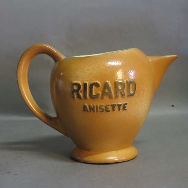 Pottery pitcher. Ricard....