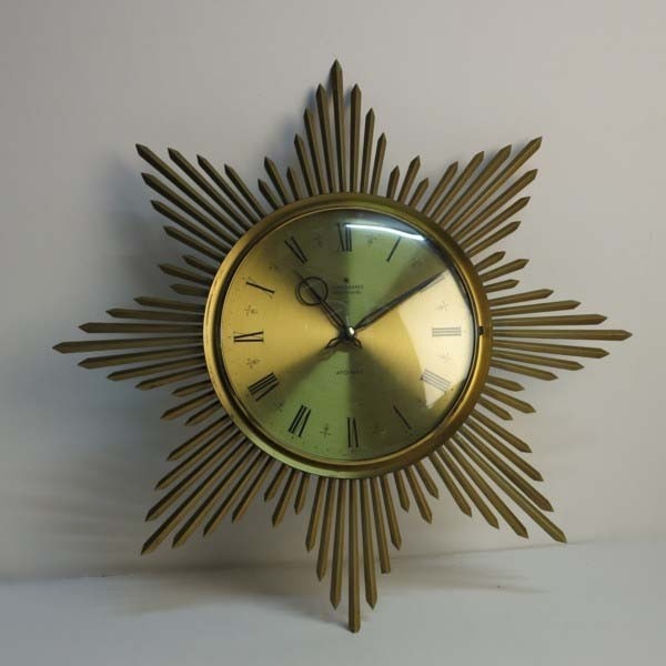 Vintage Uhr in Sonnenform....