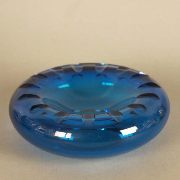 Blue round glass bowl by...