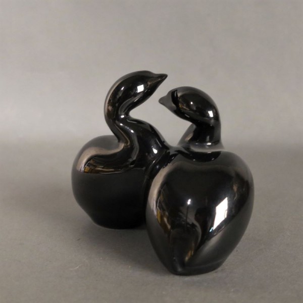 Black ceramic ducks....