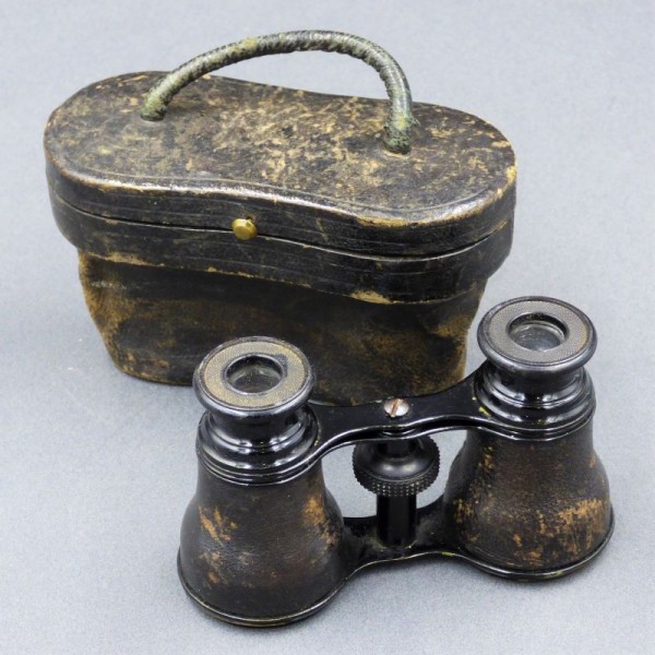 Old binocular with its...