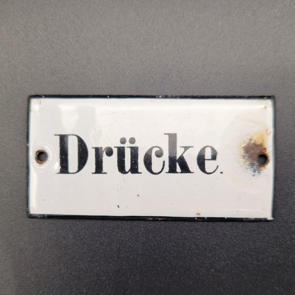 Chapa esmaltada "Drücke"....