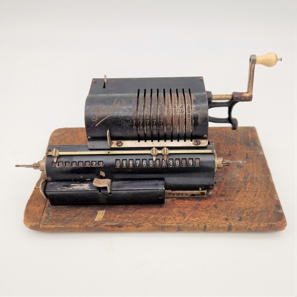 Antique calculator by...