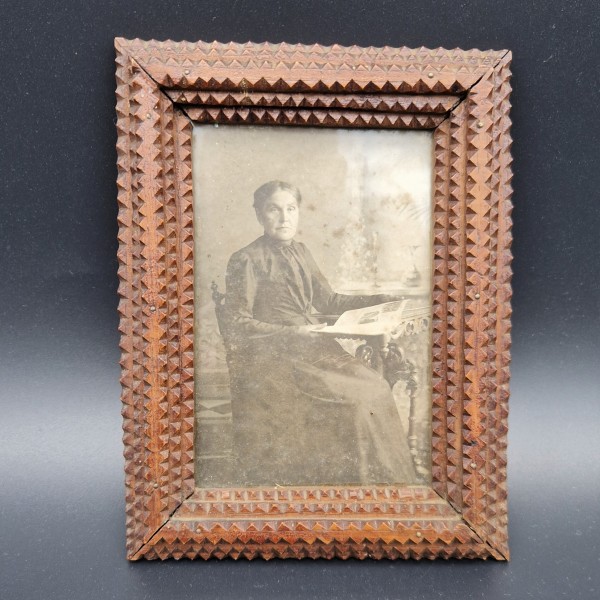 Wooden picture frame. Tramp...